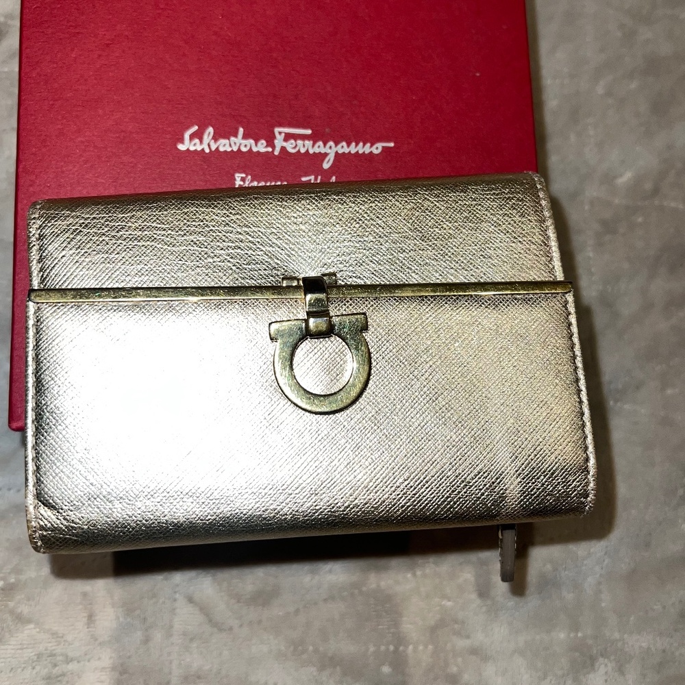 Salvatore Ferragamo metallic gold wallet